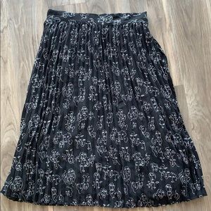 Patterned Black Pleated Midi Skirt from a new day.